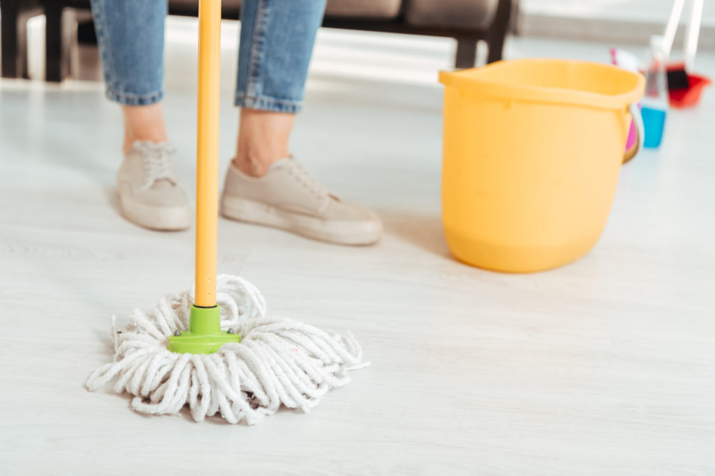 mopping floor - national cleaning week