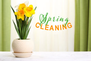 spring cleaning table with daffodils